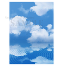 Blue sky and clouds reflected on the water