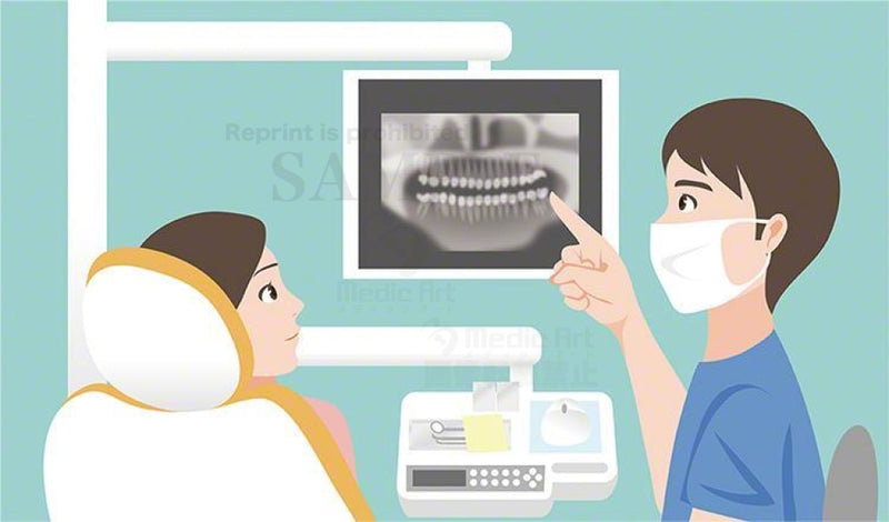 画像診断の結果を説明する歯科医師